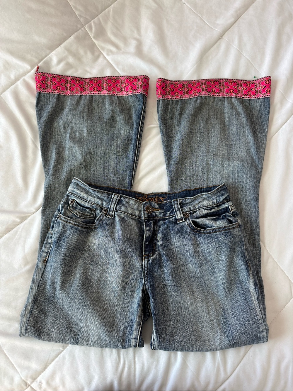 Revolt Blue Denim ultra low rise jeans with Pink Embroidered Hem